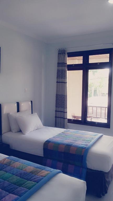 Mustika Inn Kuta Lombok Habitación foto
